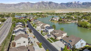 Bird's eye view with a residential view and a water and mountain view