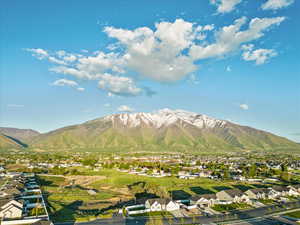 Property view of mountains featuring a residential view