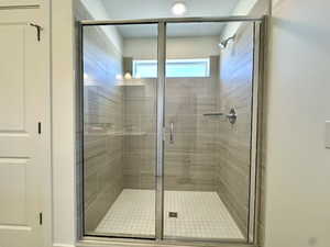 Bathroom featuring a shower stall