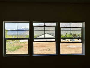 Doorway featuring a mountain view