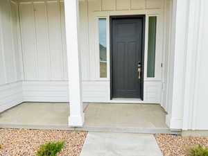 Entrance to property with a porch