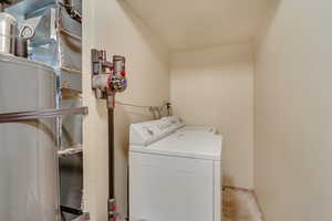 Laundry area featuring washer and dryer and laundry area