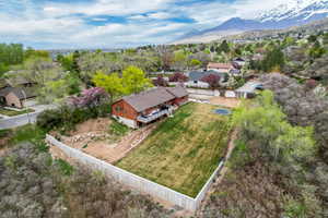 Drone / aerial view with a residential view and a mountain view