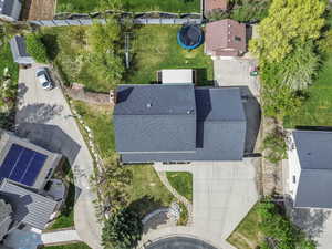 Birds eye view of property with a residential view