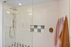 Bathroom featuring a walk in shower
