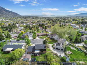 Drone / aerial view with a mountain view and a residential view