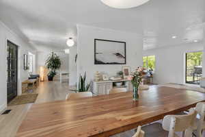 Dining area with visible vents, light wood-type flooring, recessed lighting, and baseboards