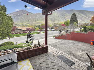 View of patio / terrace with a mountain view