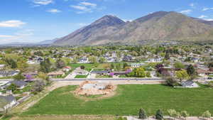 Birds eye view of property featuring a residential view and a mountain view