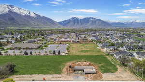 Aerial view featuring a residential view and a mountain view