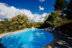 Outdoor pool with a patio