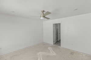 Primary bedroom with future carpet, recessed lighting, and a ceiling fan