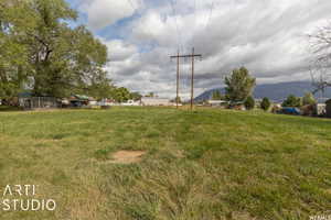 View of yard with a mountain view