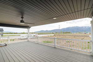 Trex Deck with a ceiling fan and a mountain view