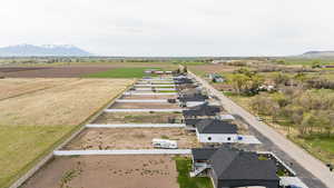 Drone / aerial view with a mountain view and a rural view