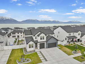 Drone / aerial view with a mountain view and a residential view