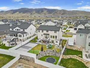 Aerial view featuring a mountain view and a residential view
