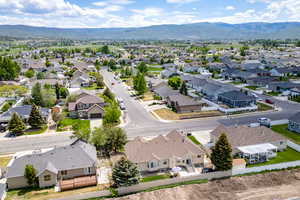 Aerial view of residential area with a mountainous background