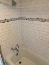 Bathroom with bathtub / shower combination