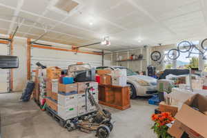 Garage featuring a garage door opener