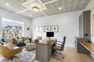 Office with baseboards, recessed lighting, and light wood-style floors
