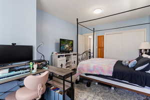 Bedroom featuring a closet