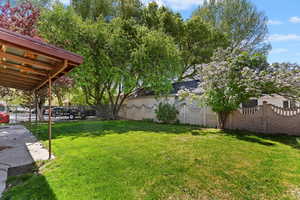 View of yard with fence