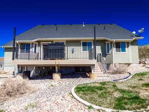 Rear view of house with deck