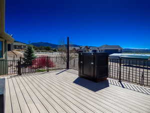 Deck with a mountain view & generator hut