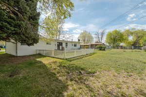 View of yard with fence