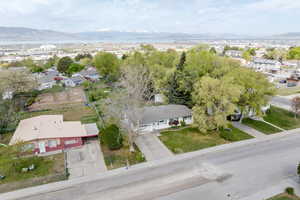 Drone / aerial view with a residential view and a mountain view