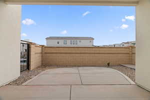View of patio with fence