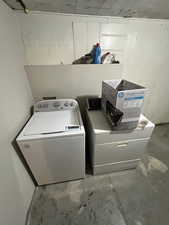 Washroom with washing machine and dryer