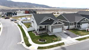 Bird's eye view featuring a mountain view and a residential view
