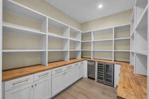 Storage area featuring beverage cooler