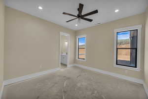 Spare room featuring recessed lighting, baseboards, visible vents, a ceiling fan, and concrete flooring