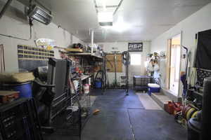 Interior space featuring a garage door opener