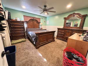 Bedroom featuring recessed lighting, a ceiling fan, light carpet, and baseboards