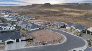 Birds eye view of property with a residential view and a mountain view