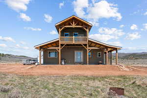 Rear view of property featuring a mountain view