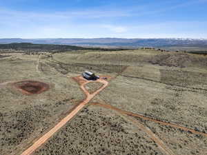 Drone of home, pond to the left has been dug, not lined.