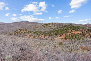 View looking ne from middle ridge with ranches fence line boundary visible.