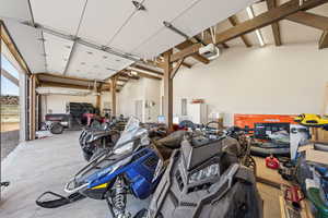 Garage with a garage door opener and electric panel