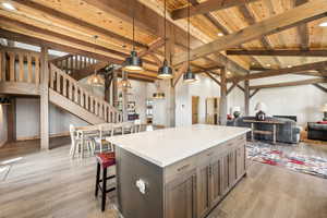 Kitchen island with dining and family room visible.