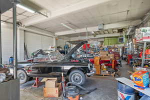 Garage featuring a workshop area