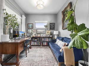 View of carpeted home office