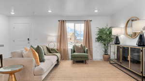 Living room with baseboards and recessed lighting