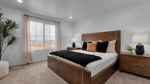Carpeted bedroom with recessed lighting, visible vents, and baseboards