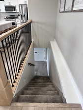 Stairs featuring carpet
