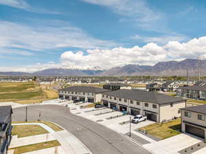Property view of mountains featuring a residential view